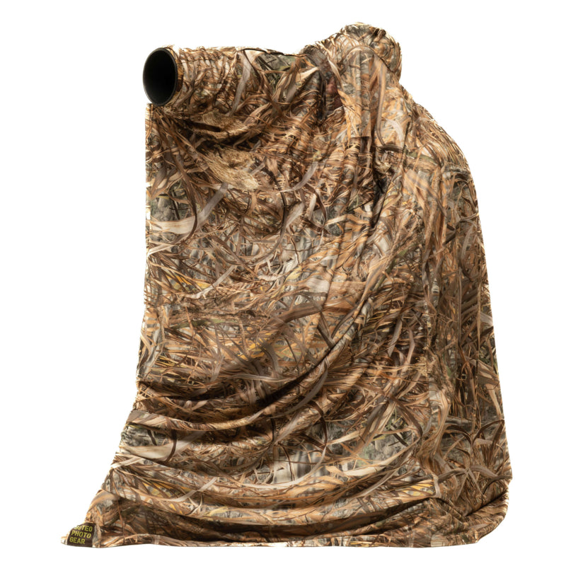 Buteo Baghide Leichtgewicht in hellem Schilfmuster, weit fallende Hülle mit Objektivöffnung oben links