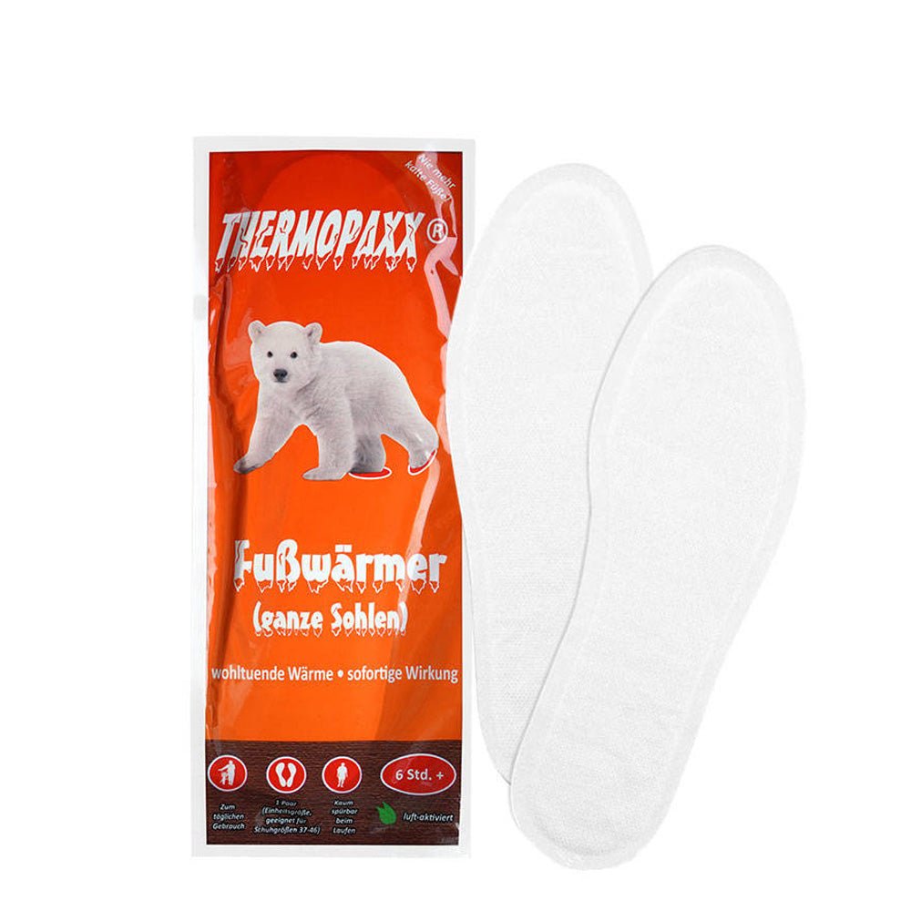 Thermopaxx Fußwärmer, orange Verpackung mit Eisbär und zwei weißen Wärmesohlen