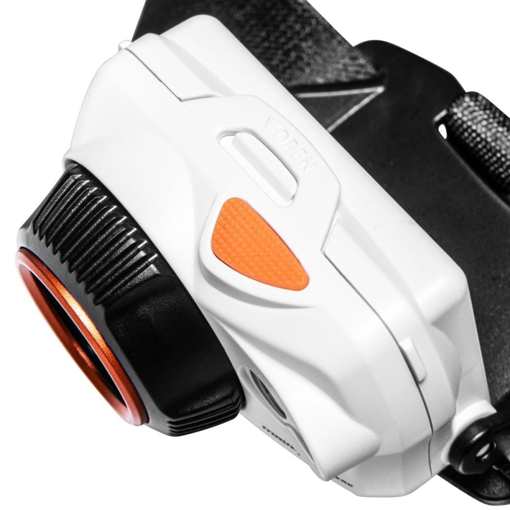 Mactronic Maverick White Peak Detail des weißen Gehäuses mit dem orangefarbenen Knopf oben